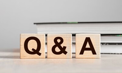 Q and A concept. QnA letters on wood blocks. Questions and answers - obrazy, fototapety, plakaty