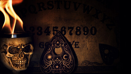 Ouija Witch Board and Skull Head on Fire - 545416801