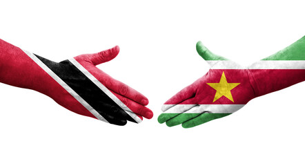 Handshake between Suriname and Trinidad Tobago flags painted on hands, isolated transparent image.