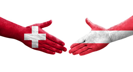 Handshake between Switzerland and Austria flags painted on hands, isolated transparent image.