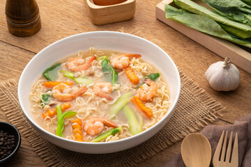 Fried Instant Noodles with Shrimp and kale carrot in Gravy Sauce (rad na goong).Thai food