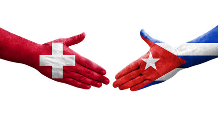 Handshake between Switzerland and Cuba flags painted on hands, isolated transparent image.