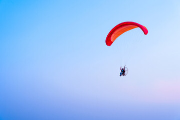 Paramotor flying on the sky, Paramotor flying on the sky ,adventure man active extreme sport pilot flying in sky with paramotor