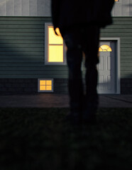 Fototapeta na wymiar Lone man in suit stands by an illuminated house at dusk. Rear view. 3D render.