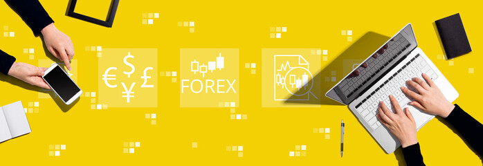 Forex trading concept with two people working together - obrazy, fototapety, plakaty
