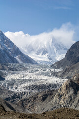 Autumn view of Passu Glacier in the Gilgit Baltistan region of northern Pakistan. Passu Glacier is situated in the south side of Passu village. Passu Peak is situated in the back side of the glacier. 