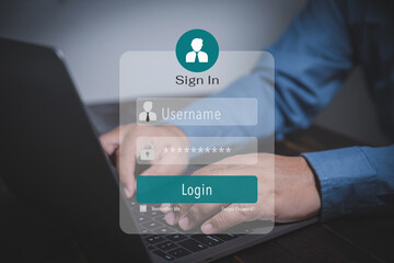Protect the security of the database. Businessman using a laptop for login private by username and password. Login system by username and password for protecting private data.