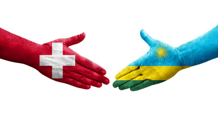 Handshake between Switzerland and Rwanda flags painted on hands, isolated transparent image.