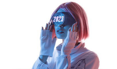 Woman in futuristic costume. Female in modern VR glasses interacting with network while having...