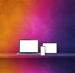 Laptop, mobile phone and digital tablet pc on rainbow wall shelf. Square background