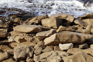 The stones lie on the shores of the Mediterranean Sea.