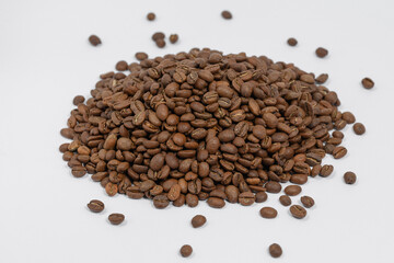 Spilled roasted coffee beans, place for Copy space.