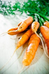 Fresh carrots on a wood table