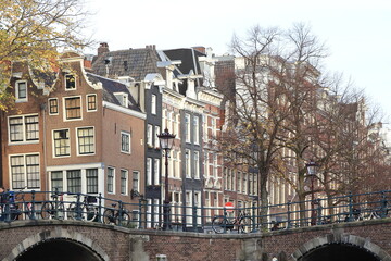 Obraz premium Amsterdam Keizersgracht and Reguliersgracht Canal Houses View with Bridge and Autumn Foliage, Netherlands