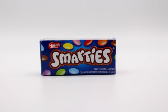 Closeup shot of Nestle Smarties Chocolate Candies on a white surface