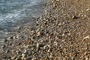 The stones lie on the shores of the Mediterranean Sea.