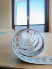 Bright light view through a Meter for tailoring. Abstract futuristic design background.