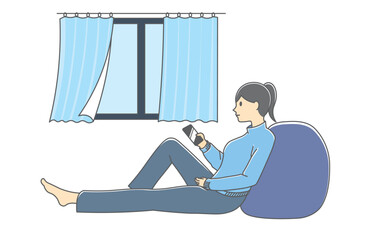 部屋でリラックスする女性