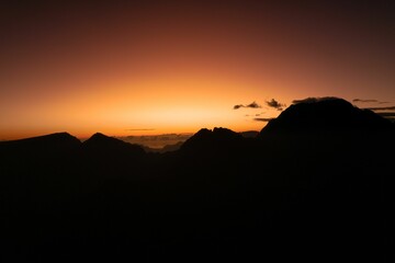 Beautiful shot of mountains silhouettes during the sunset