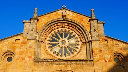 Fototapeta na wymiar Low angle shot of the historic Avila Cathedral in Old Castile, Spain