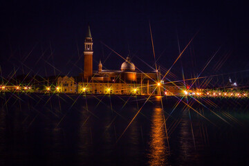 Fototapeta na wymiar View of the island of San Giorgio Maggiore in the dark, visible from the main island