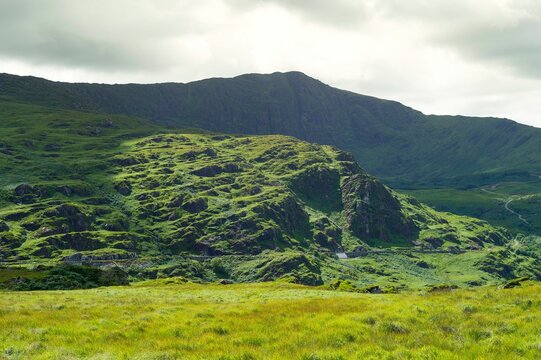 Beautiful shot of a green covered mountains in Kerry in Ireland