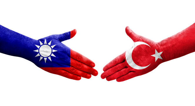 Handshake between Taiwan and Turkey flags painted on hands, isolated transparent image.