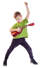 Cute boy playing the ukulele guitar isolated on white background - 545457460
