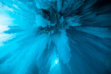 Low angle of an ice formation with hanging huge blue icicles