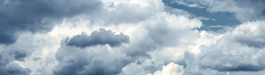 Dark stormy sky with dark and light picturesque clouds