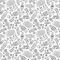 Candies in wrappers seamless pattern. Hand drawn doodles on white background. Vector illustration.