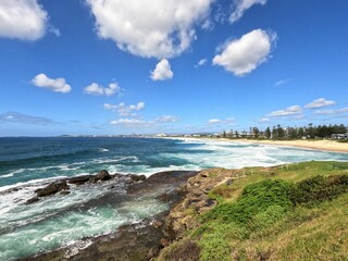 Calming scenery of the sea washing the coast on a sunny day