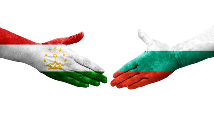 Handshake between Tajikistan and Bulgaria flags painted on hands, isolated transparent image.