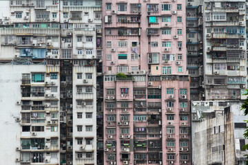 Fototapeta na wymiar Exterior of an old skyscraper in Kowloon, Hong Kong