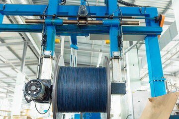 production of glass fiber fiber optic cable in the factory, Internet telecommunications wires in...