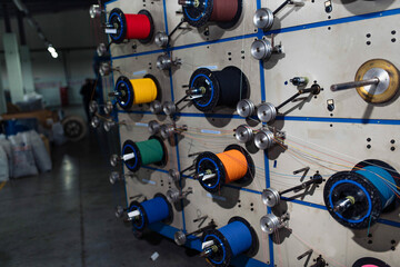 production of glass fiber fiber optic cable in the factory, Internet telecommunications wires in...