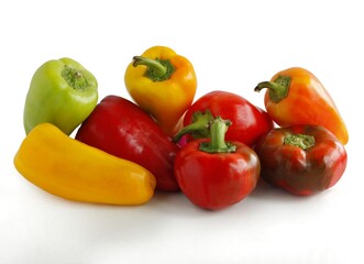 red,orange,yellow and green peppers as tasty vegetable for salad or cooking vegetarian meals