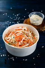 Bowl of coleslaw with shredded cabbage