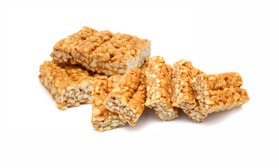 Honey bars with peanuts, sesame and sunflower seeds isolated