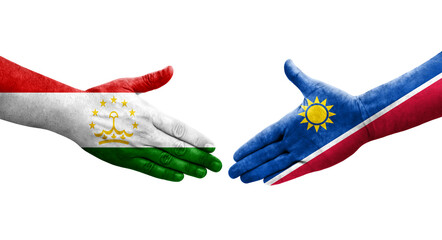 Handshake between Tajikistan and Namibia flags painted on hands, isolated transparent image.