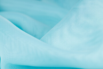 blue silk fabric. wavy fabric texture