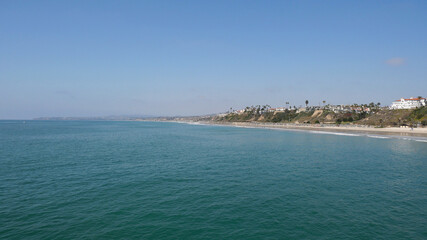 Beach next to the San Clemente Pier in Orange County, California, USA