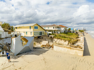 Beach homes collapse aftermath Hurricane Nicole Daytona Florida