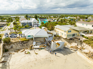 Beach homes collapse aftermath Hurricane Nicole Daytona Florida