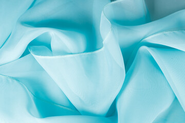 blue silk fabric. wavy fabric texture