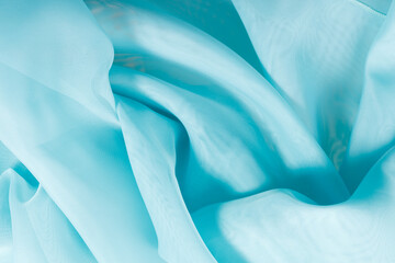 blue silk fabric. wavy fabric texture