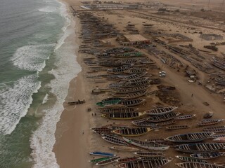 Aerial view of a bunch of wooden boats on the port of Nouakchott, Mauritania