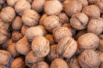 walnuts in a box on a market