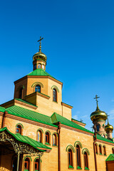 Obraz premium Christian church cross in high steeple tower for prayer