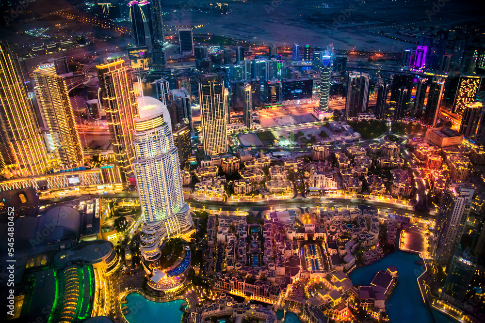 Wall mural dubai city at night, view with lit up skyscrapers and roads. uae, 2022